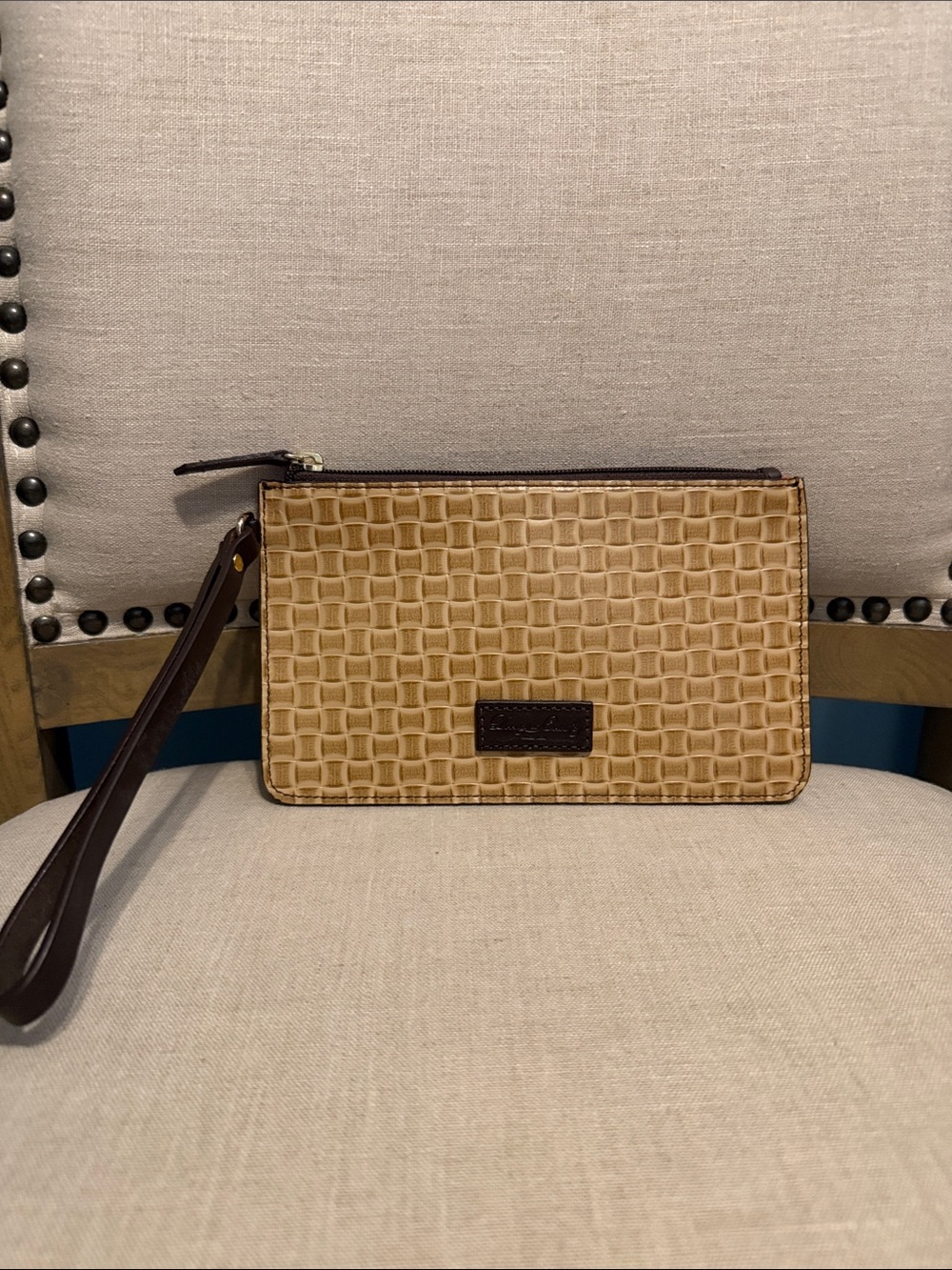 Dooney & Bourke “Lilliana” Tan Slim Woven-Embossed Leather Wristlet